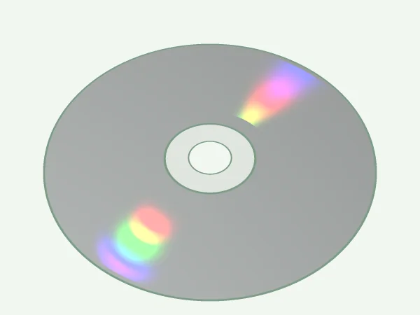 A CD under a lamp, tilted 40 degrees. Two bands of color run along its radius on opposite sides of the center, and their colors depend on the tilt.